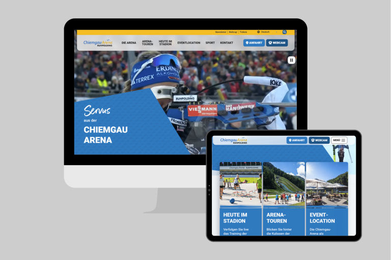 Responsive Darstellung der Chiemgau Arena Website auf einem Desktop-Monitor und einem Tablet. Das Design zeigt ein großflächiges Hero-Bild einer Biathletin am Schießstand sowie Teaser-Kacheln für Stadion-Erlebnisse, Arena-Touren und Event-Locations.